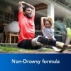 Image showing two people stretching with the camption: Non-drowsy formula